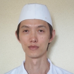 黒政 賢志